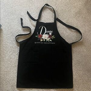 Black Apron with Floral Design
Two front pockets